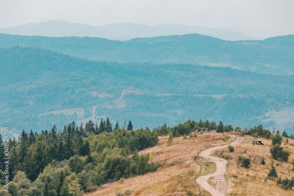 Fototapeta premium trail road in mountains autumn landscape
