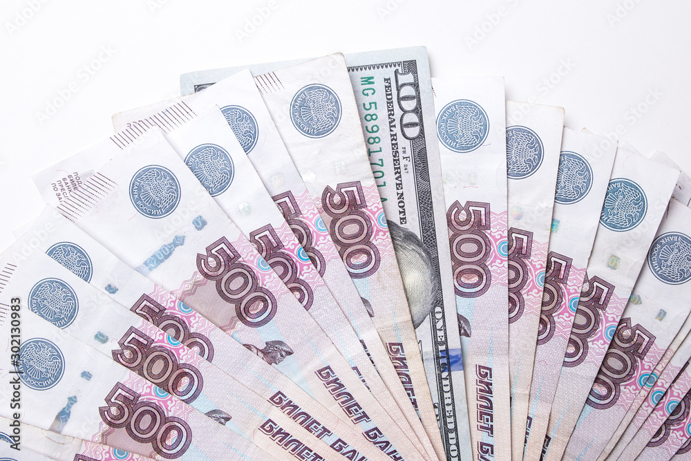 Ruble Russian currency and dollar close-up. Exchange rate. The dollar to ruble exchange rate.