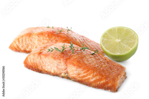 Delicious roasted fish with thyme and lime isolated on white
