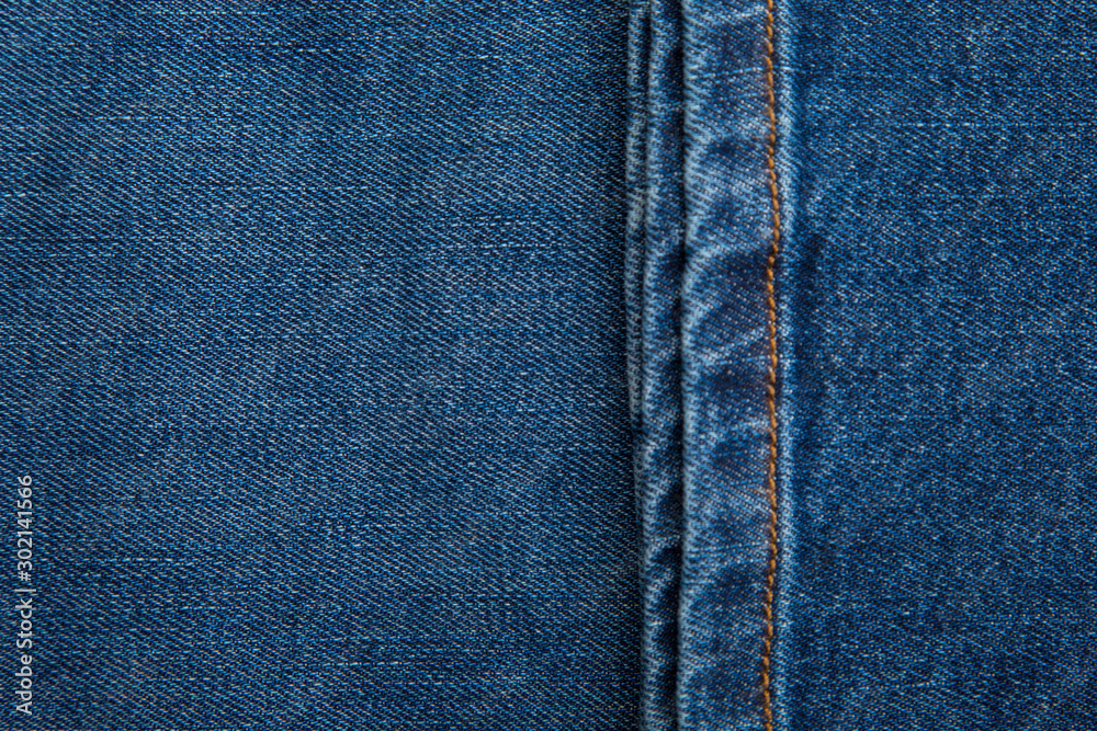 Denim grunge texture. Jeans close-up Denim grunge texture. Jeans close-up