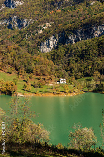 Fototapeta Naklejka Na Ścianę i Meble -  Lago di Tenno, small and beautiful lake in Italian alps (Monte Misone), Trento province, Trentino-Alto Adige, Italy, Europe