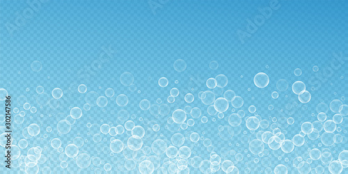 Random soap bubbles abstract background. Blowing b