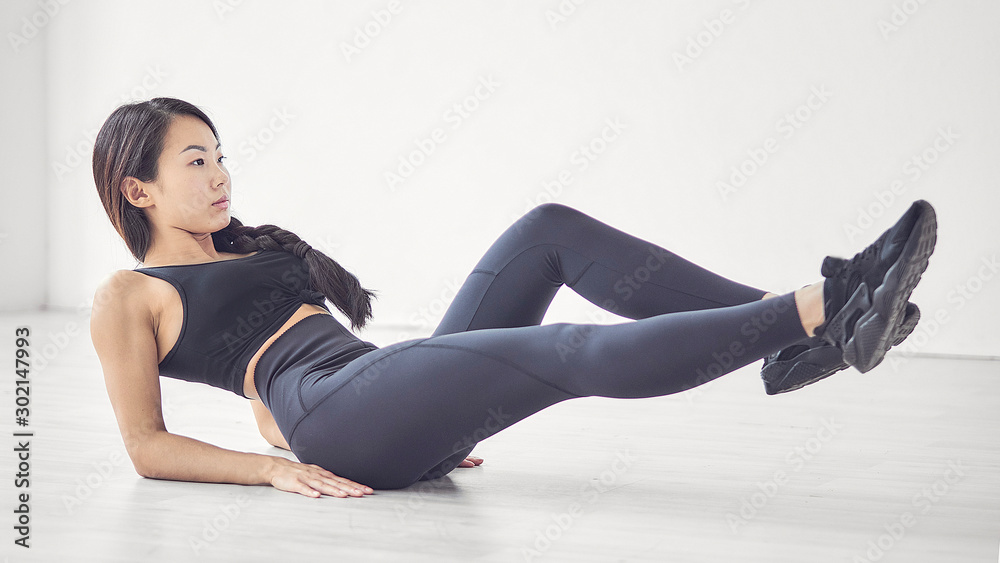 Asian woman workout on white background Asian woman workout on white background