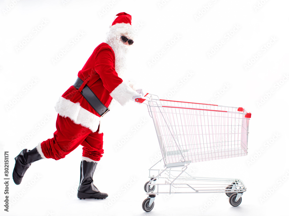 Happy Santa Claus with Christmas shopping cart Happy Santa Claus with Christmas shopping cart