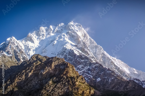 Snow storm on the top of the Nanga Parbat peak photo