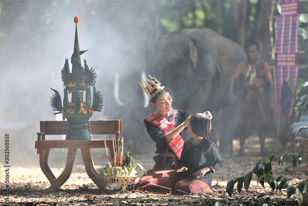 Shepherd in the jungle with elephantsThe elephants performed the ritual together with the elephants in the rice fields