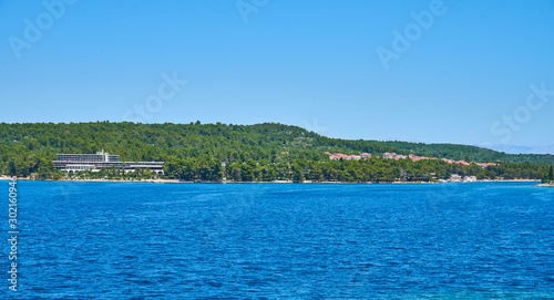 Beaches of Hvar, Croatia; turquoise waters, green pine trees and rocks 