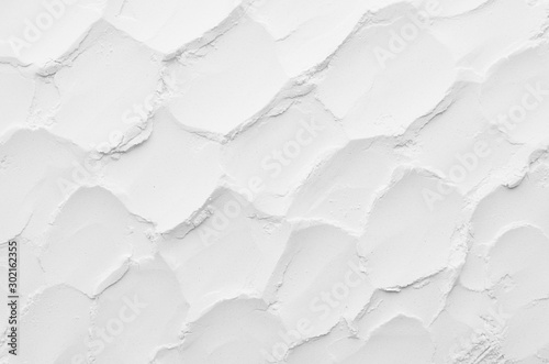 White abstract squama texture on powder as random decorative background. photo