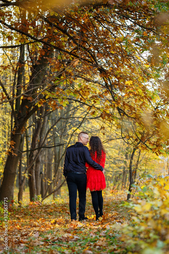 Beautiful couple in the autumn forest © Дмитрий Ткачук