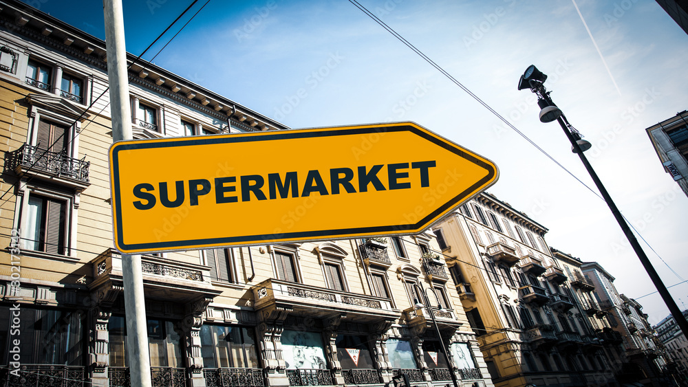 Obraz premium Street Sign to Supermarket