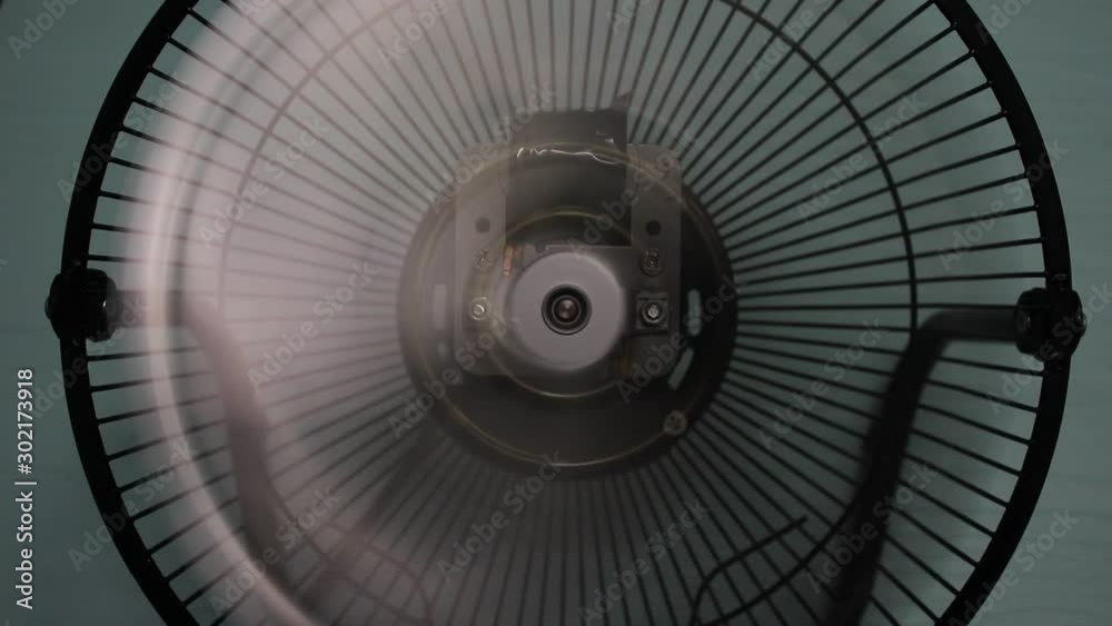 The blades of the ventilation fan while starting to work. The blades of the ventilation fan while starting to work.