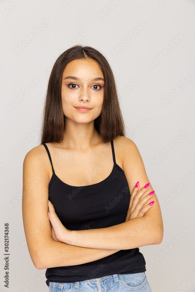Female model with pretty face standing isolated on the white background Female model with pretty face standing isolated on the white background