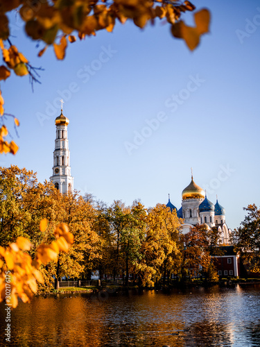 Nikolo-Ugreshsky Monastery, Dzerzhinsky, Moscow Region. St. Nicholas Ugreshsky monastery in autumn leaves. photo