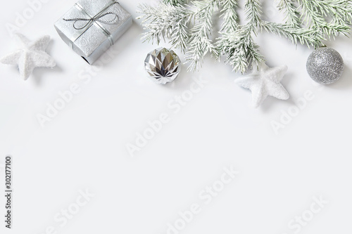 Christmas decoration and fir tree on white background.