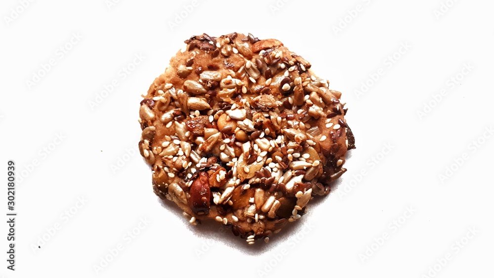 Healthy fitness cookies with seeds isolated on white background. Concept of healthy nutrition. Vegetarian food.