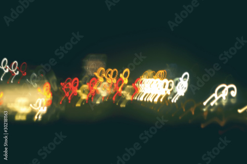 Foto Bokeh with colorful spherical lights alternating with the background image
