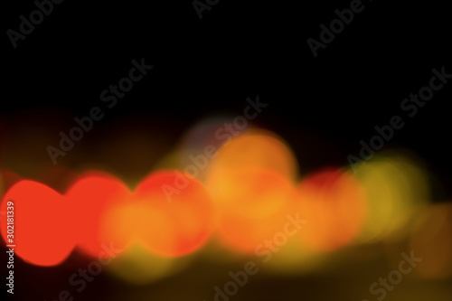 Foto Bokeh with colorful spherical lights alternating with the background image
