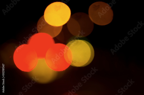 Bokeh with colorful spherical lights alternating with the background image