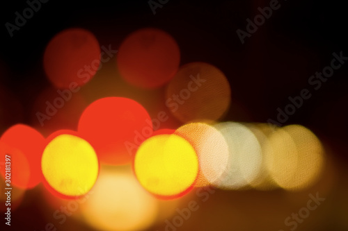 Foto Bokeh with colorful spherical lights alternating with the background image