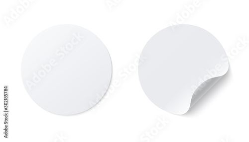 Realistic template of white round paper adhesive sticker with curved edge