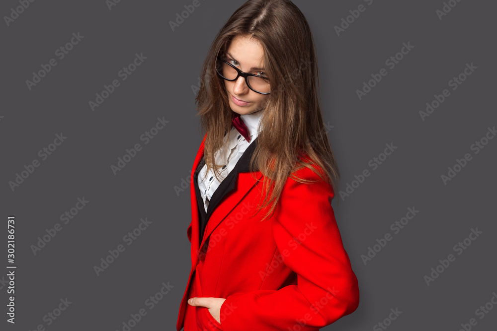 African american woman in red pants and white fur coat jacket