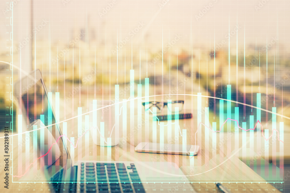 Stock market graph and table with computer background. Double exposure. Concept of financial analysis. Stock market graph and table with computer background. Double exposure. Concept of financial analysis.