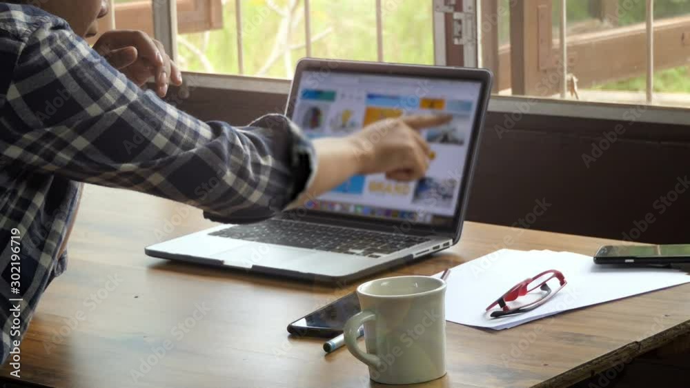 Businesswoman working at her office via laptop Businesswoman working at her office via laptop