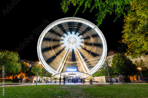 Budapest, Hungary - October 01, 2019: Budapest Eye (ferris wheel) at Erzsebet Square. Luminous Ferris wheel in night city. Budapest Eye at night.