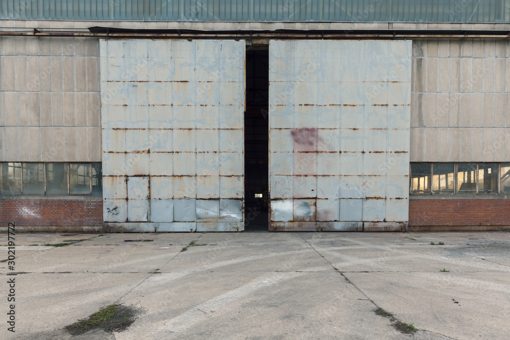 Fototapeta industrial door from an abandoned factory