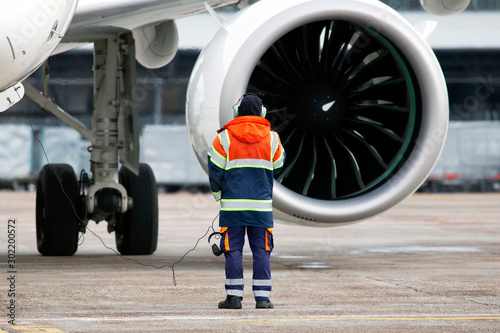 A ground control manager controls start turbofan engine process before aircraft departing