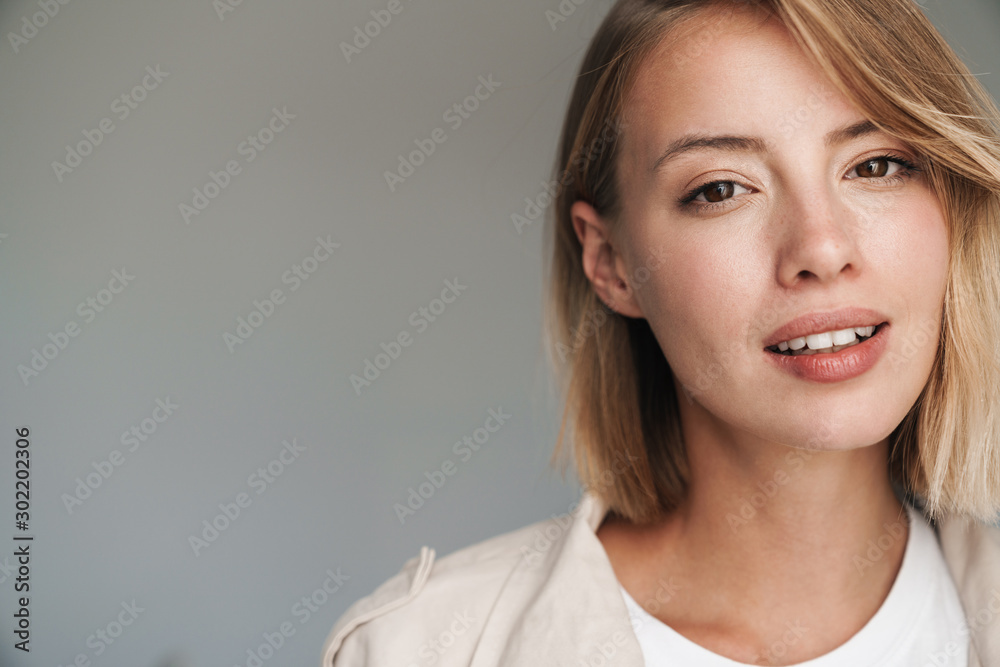Close up of a lovely young blonde short haired woman Close up of a lovely young blonde short haired woman
