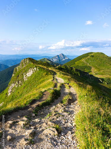 View from the summit of the beautiful mountains on a summer day. Way to the top, ridge. Western Carpathians, Slovakia, Little Fatra.