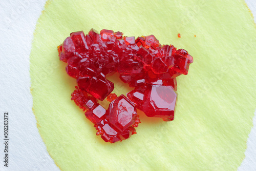 Red crystals of potassium hexacyanoferrate of rhombic form. photo