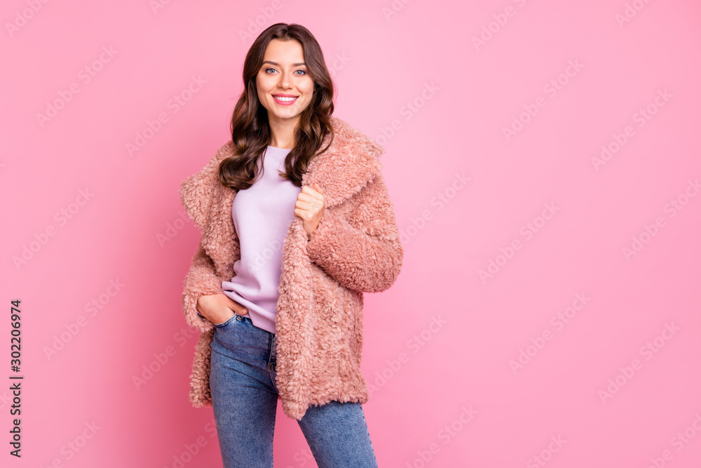 Photo of amazing millennial model lady standing confidently holding hand in pocket wearing stylish youth fluffy autumn jacket jeans isolated pink background - obrazy, fototapety, plakaty 