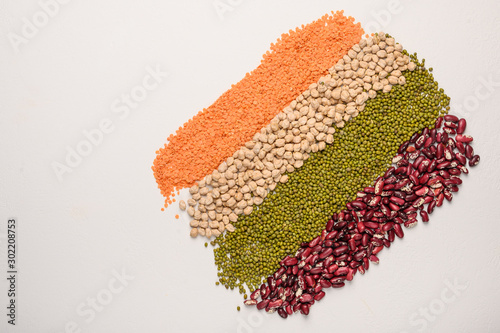 Concept of legumes chickpeas, lentils, beans, mash. Protein plant background top view