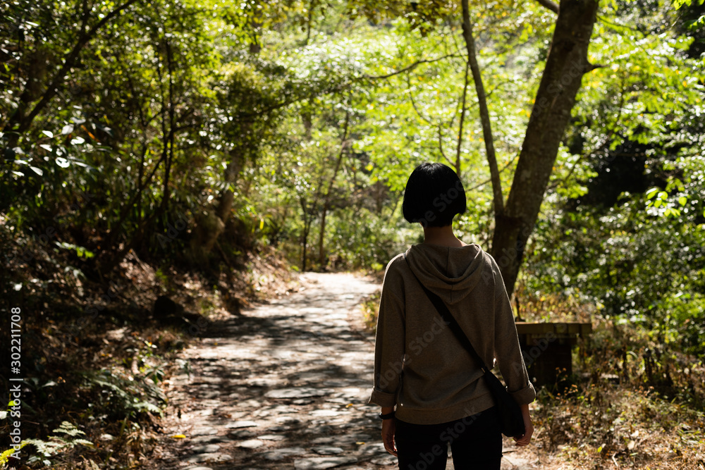 Asian woman hiking at the outdoor