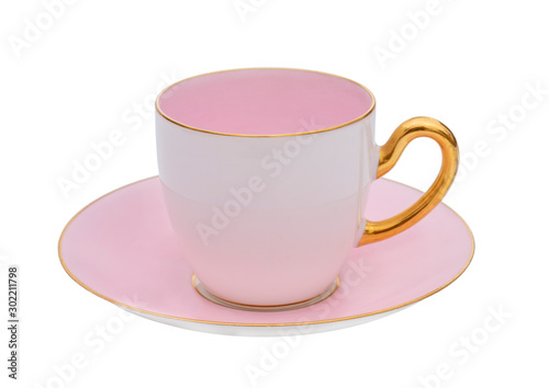 Fotografie Pretty pink and white classic cup and saucer with gold handle, isolated on white background