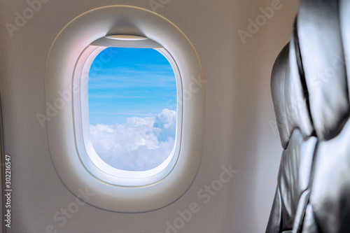Window View From Passenger Seat On Commercial Airplane.
