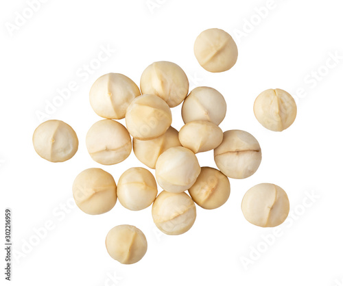 Bild auf Leinwand Peeled Macadamia nut on a white background. top view