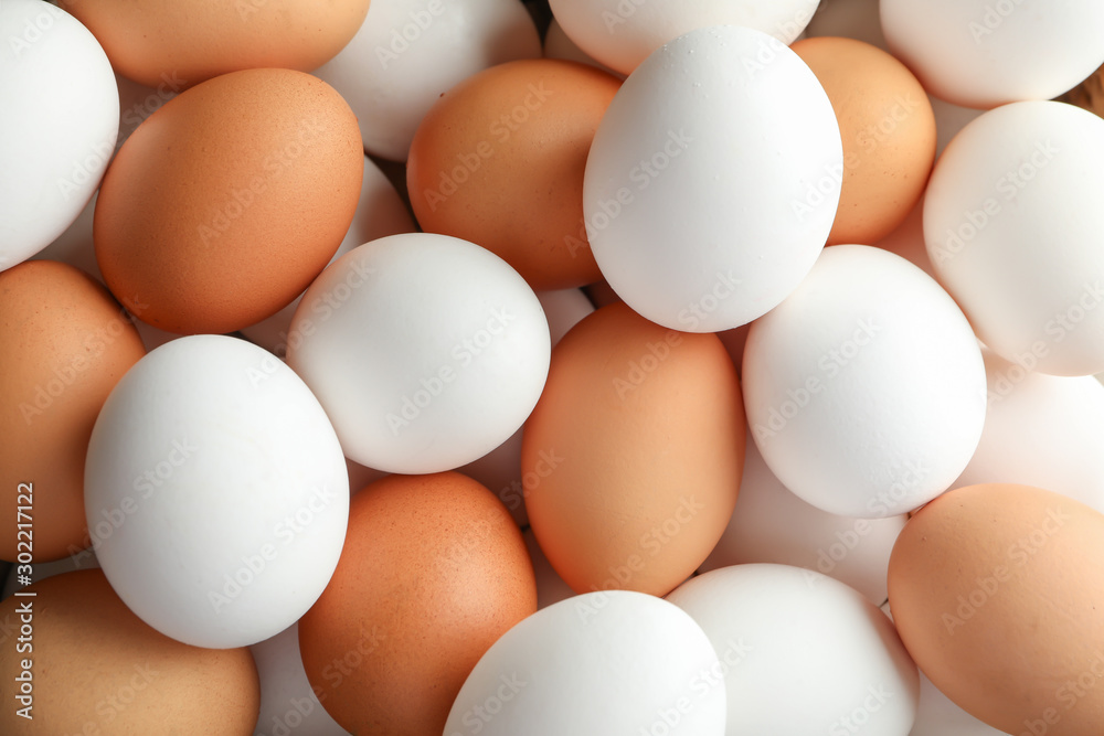 Many chicken eggs as background, space for text Many chicken eggs as background, space for text