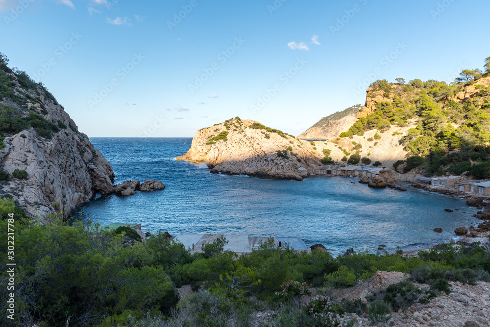 Turquoise waters in Es Portitxol, Ibiza, Spain. Hidden bay on the Island of Ibiza, in Sant Joan de Labritja.
