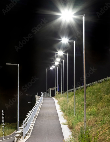 Fototapeta Naklejka Na Ścianę i Meble -  walkway for pedestrians with modern led street lights
