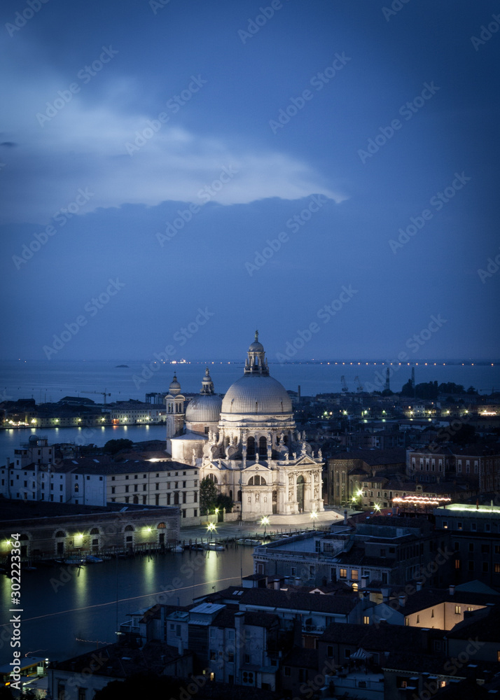 Basilica di Santa Maria della Salute, Venice, Italy. An elevated night view of the domed Venetian landmark church known simply as Salute.
