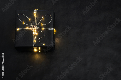 Present Box wrapped with string lights