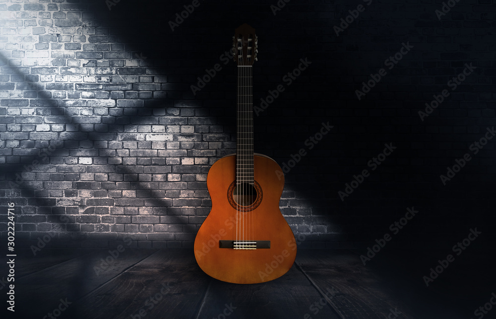 Guitar in a dark room with brick walls, wooden floor. Abstract light. Dark empty scene with a musical instrument.