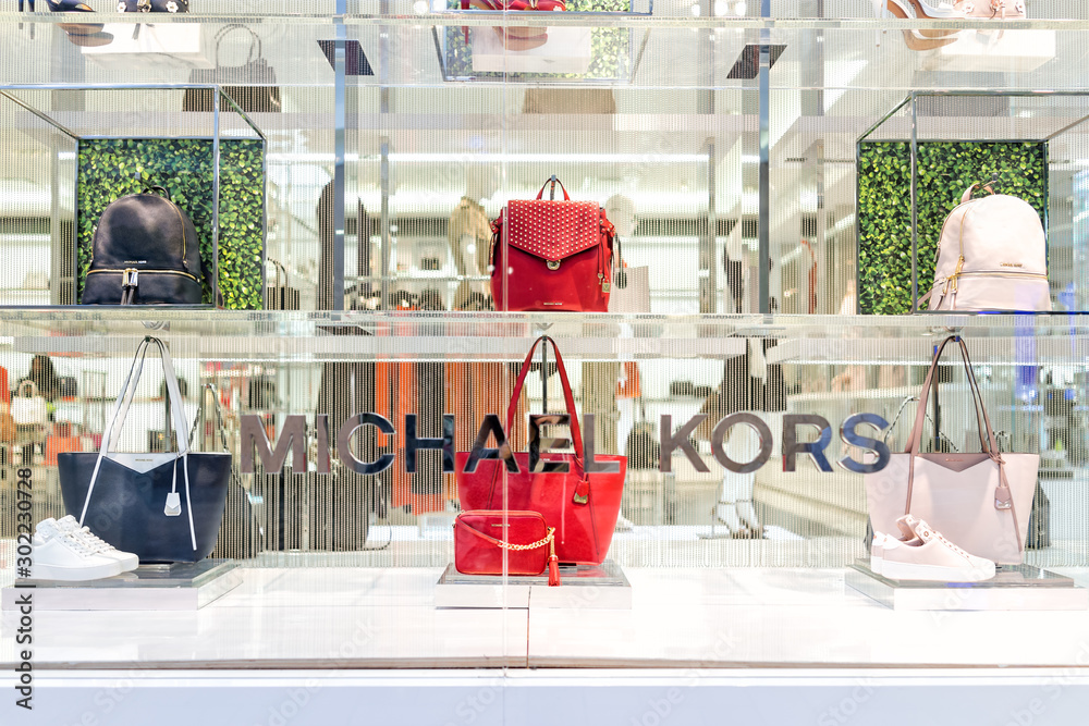 Tysons, USA - January 26, 2018: Michael Kors store sign entrance shop  purses display in Tyson's Corner Mall in Fairfax, Virginia by Mclean Stock  Photo | Adobe Stock
