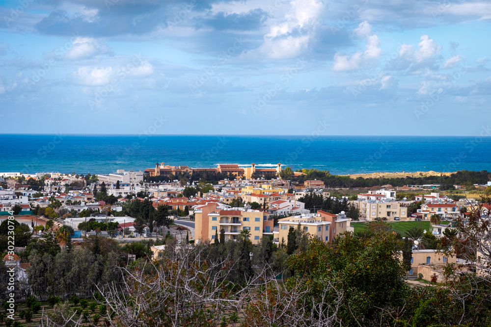 High point view to the Paphos city with buildings, sea and sky.