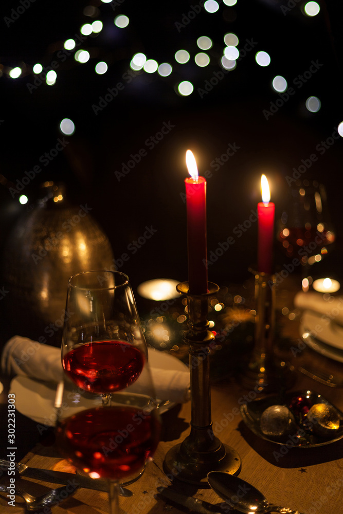 festive christmas table with candles and gold decoration cozy family meal festive christmas table with candles and gold decoration cozy family meal