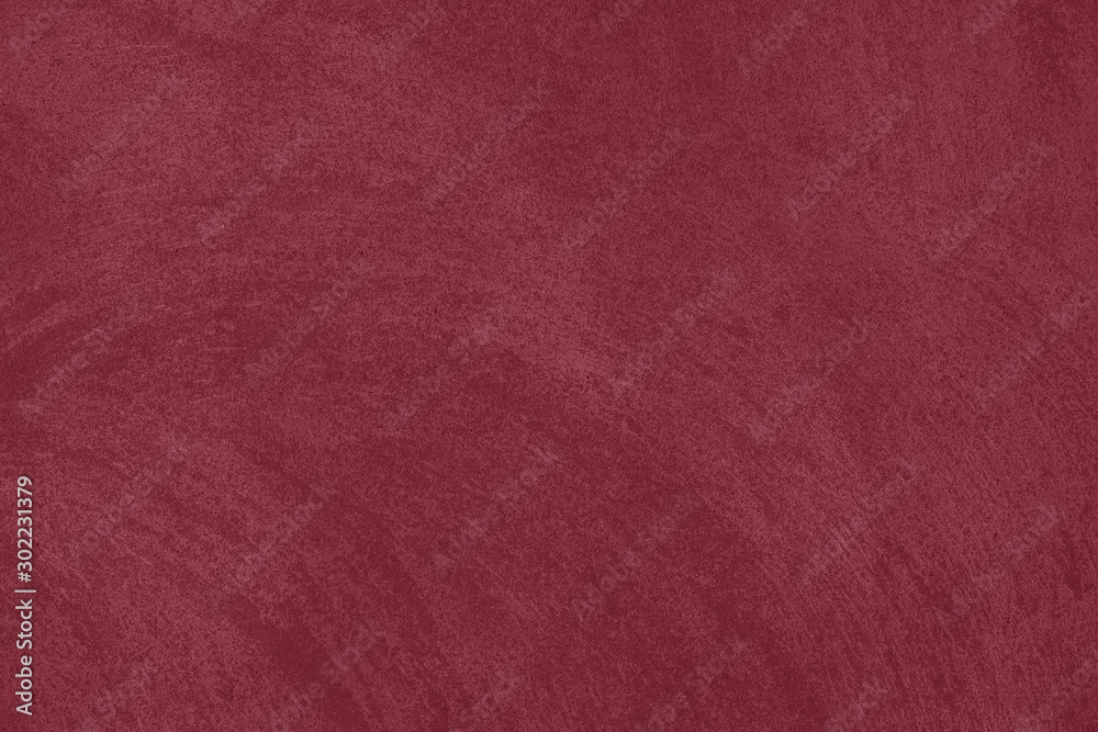 Fototapeta premium Dark red low contrast concrete textured wall background to your concept or product. Winter color trend.