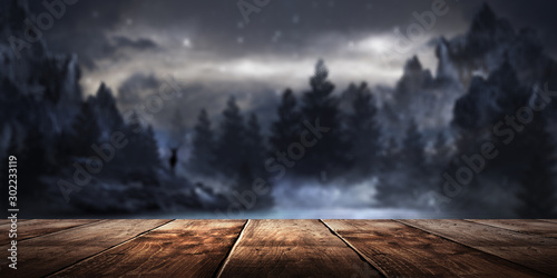 Wooden table night landscap...